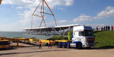 Yacht Mould being loaded from barge
